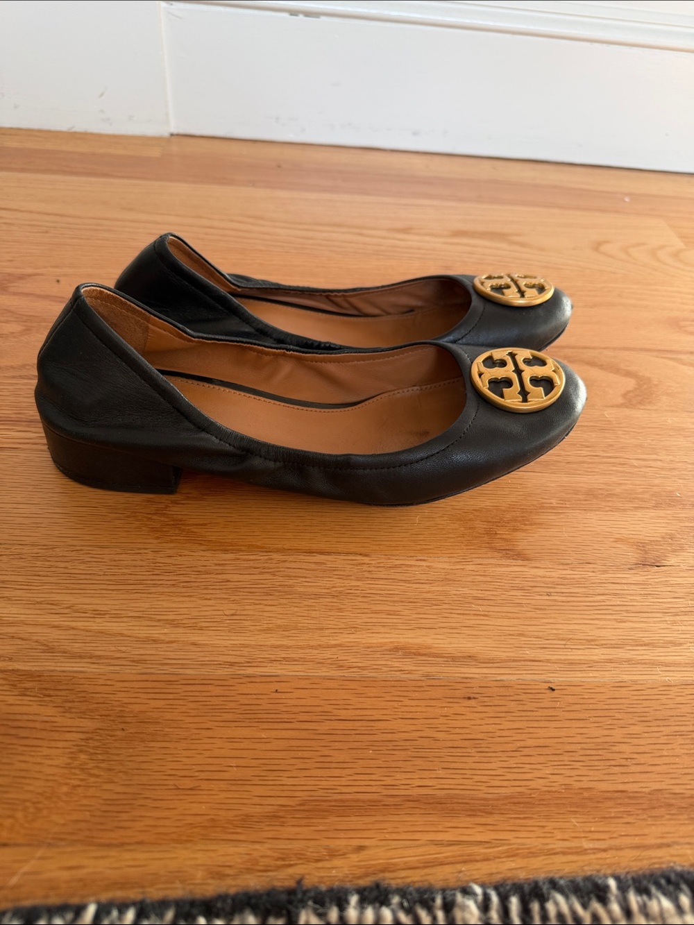 Tory Burch Black Leather Ballet Flats with Gold Logo Medallion